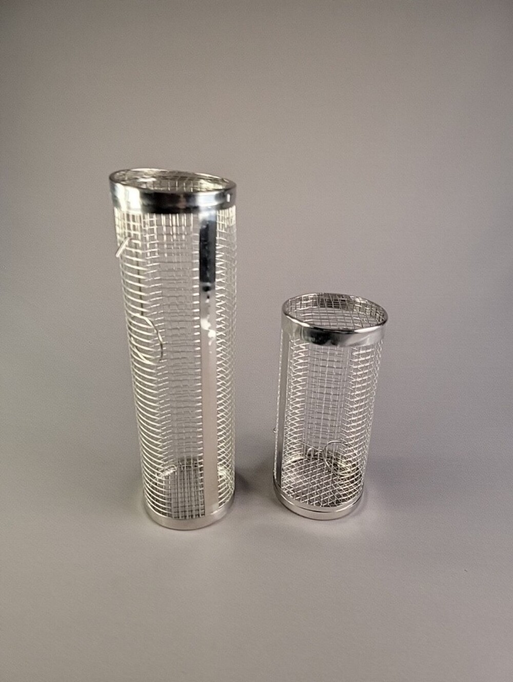 Set of Two Stainless Mesh Round Grilling Baskets With Metal Handles.